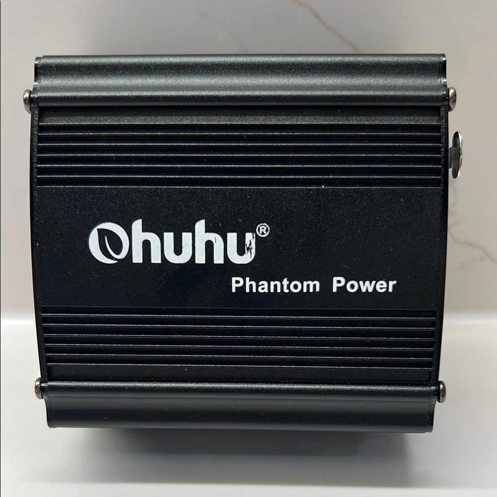 Ohuhu Phantom Power Supply, a device used in audio setups